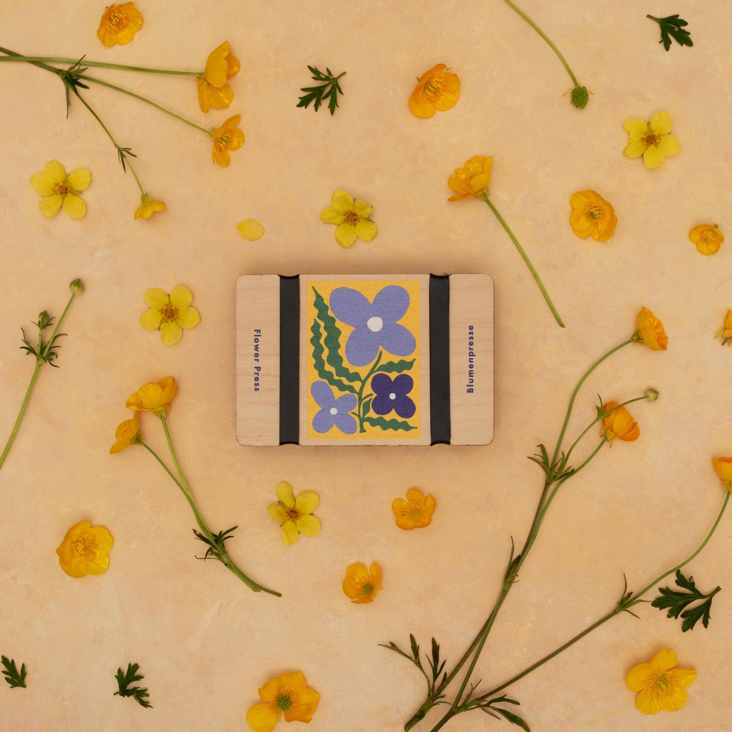 Blue smock pocket flower press