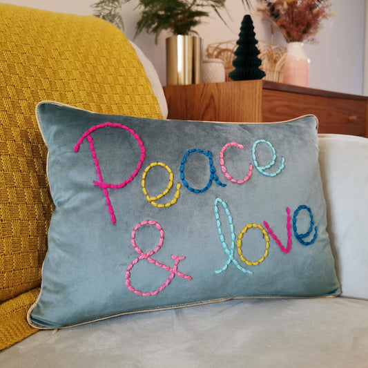 Peace & Love embroidered velvet cushion