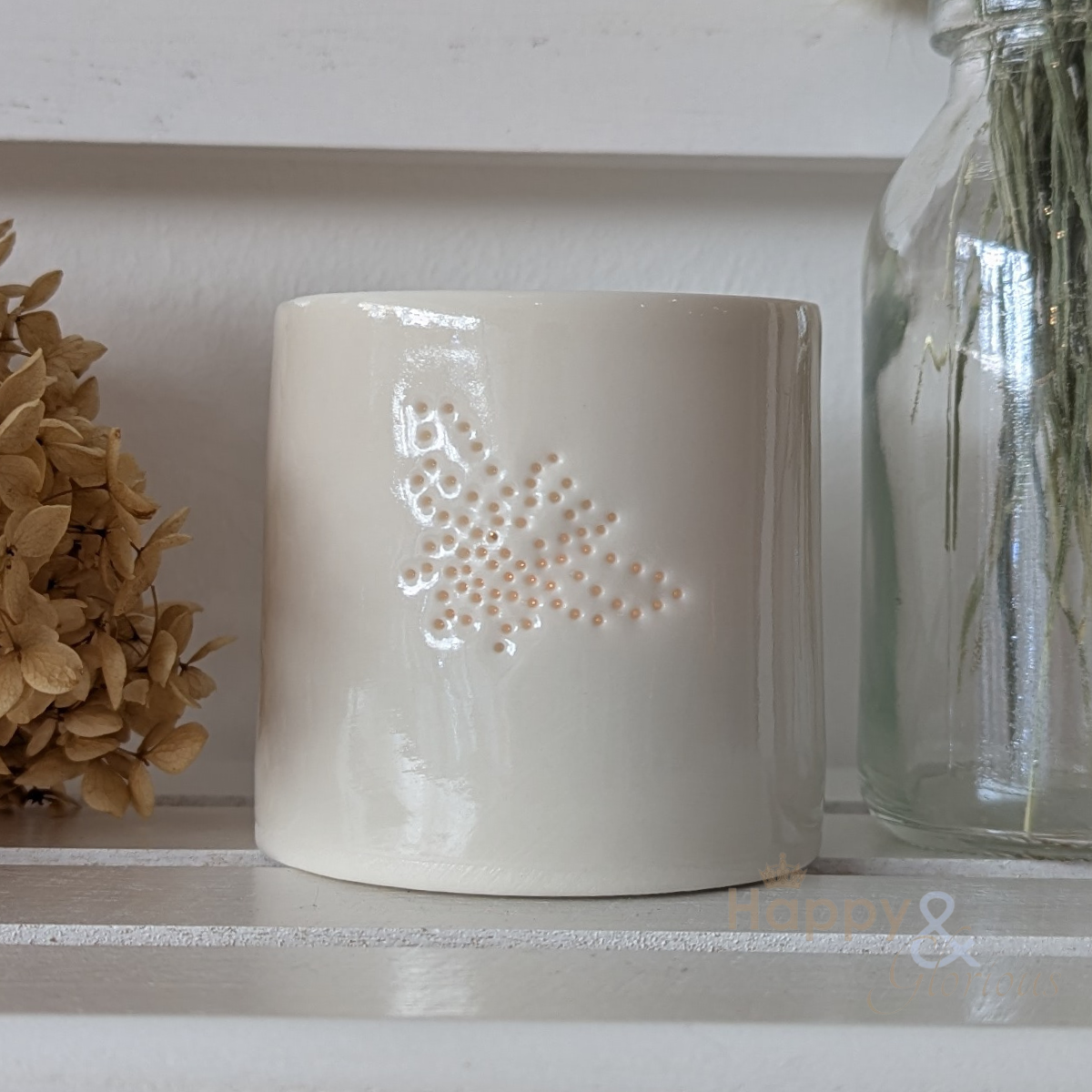 Porcelain bee tealight candle holder by Luna Lighting