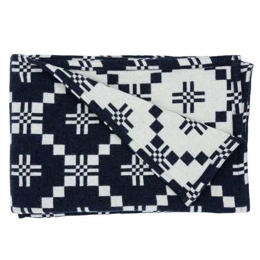 Black & white Nos St David's Cross lambswool throw by Melin Tregwynt