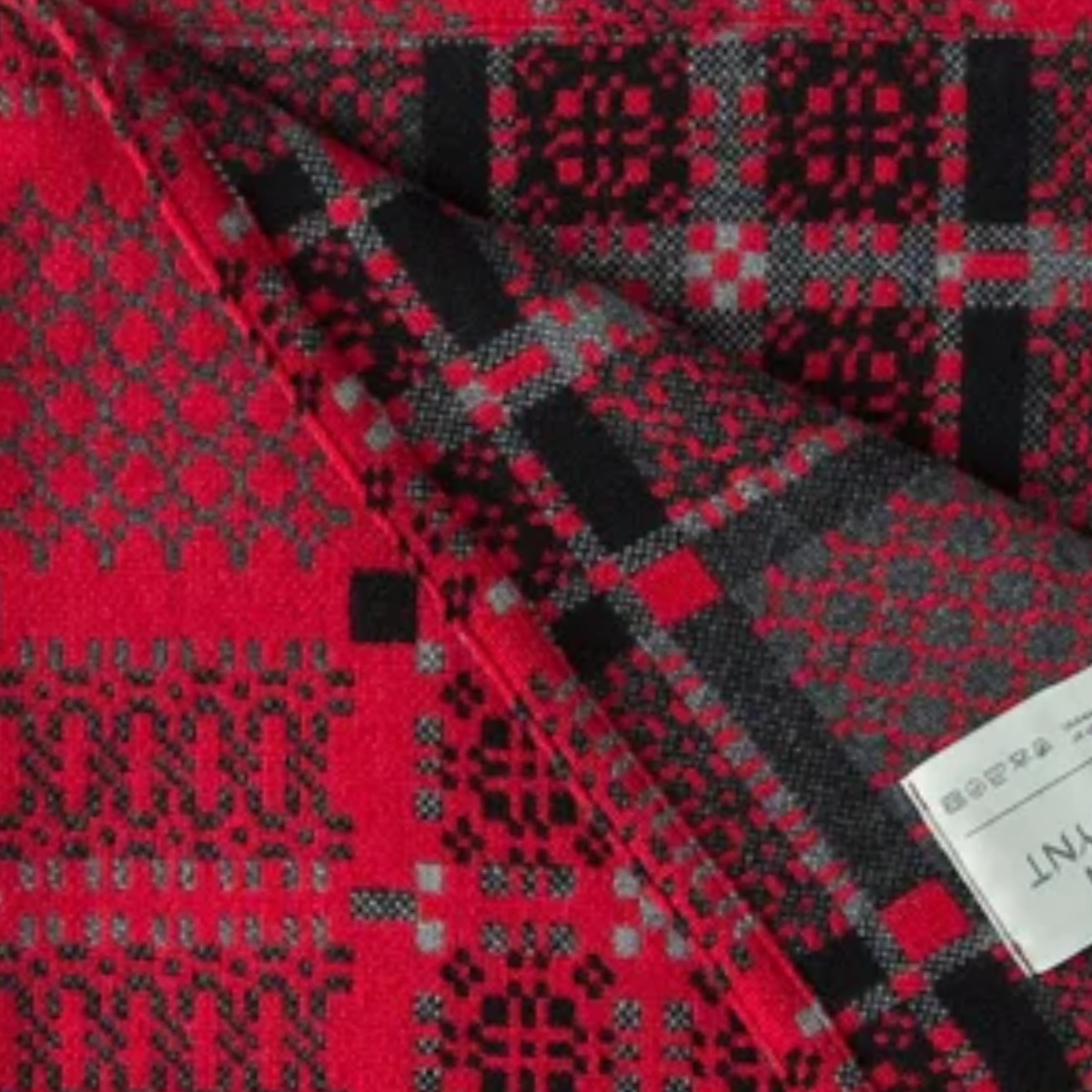 Red 'Knot Garden' pure lambswool throw by Melin Tregwynt