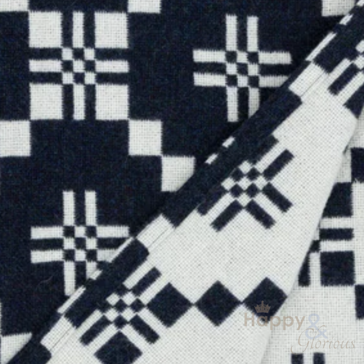 Black & white Nos St David's Cross lambswool throw by Melin Tregwynt