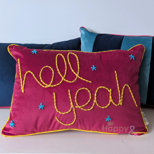 Hell Yeah embroidered pink velvet cushion