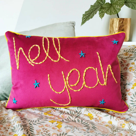 Hell Yeah embroidered pink velvet cushion