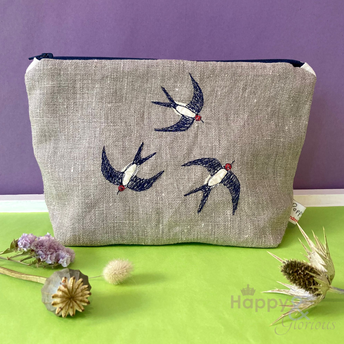 Embroidered swallows makeup bag