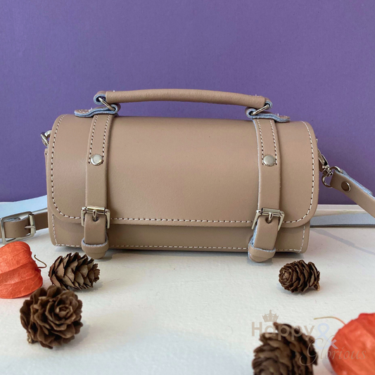 Handmade iced mocha leather bowler bag