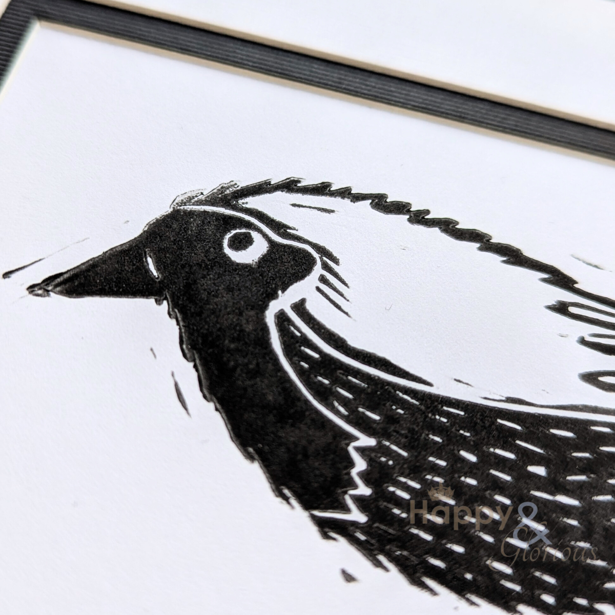 Startled robin lino print by Kate Tompsett