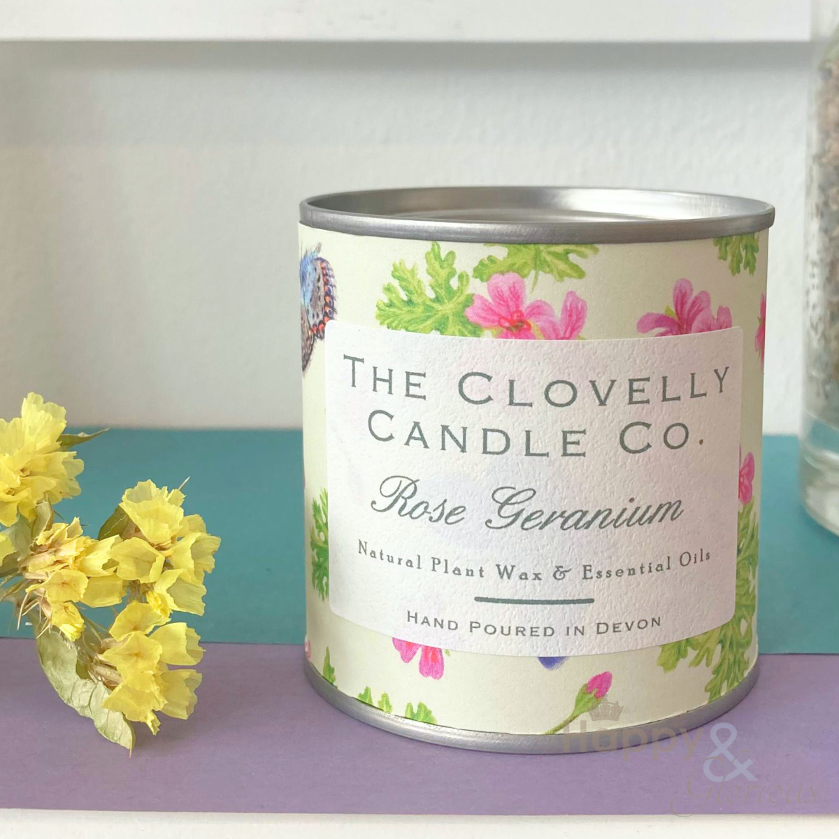 Clovelly rose geranium essential oil candle in tin