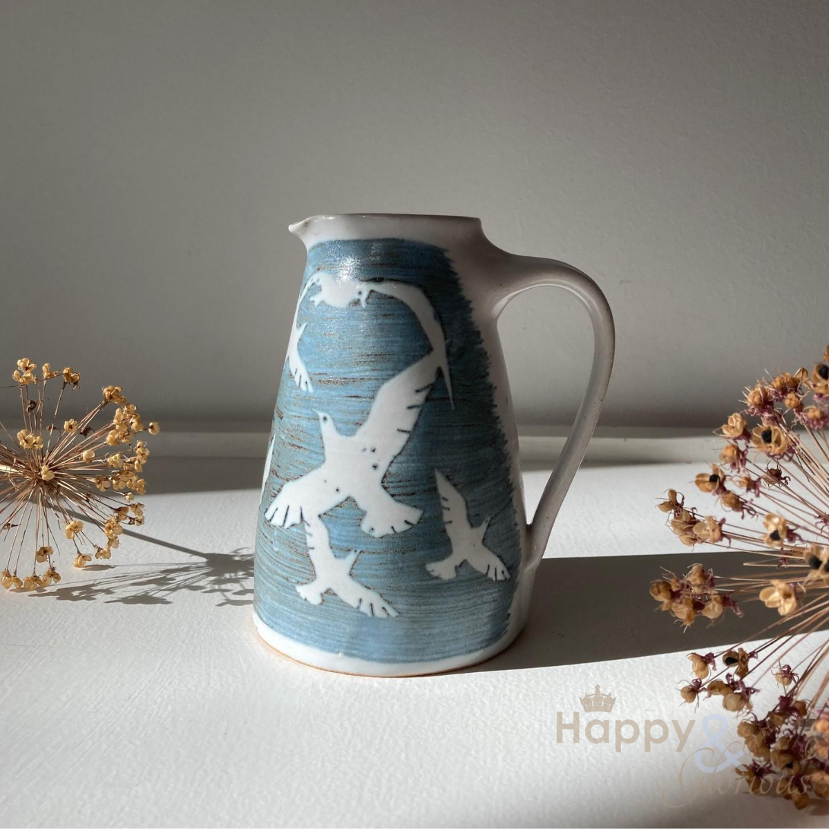 Handmade seagull stoneware jug