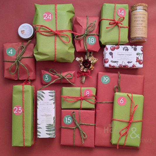 Advent calendar with red and green wrapped presents on a red background