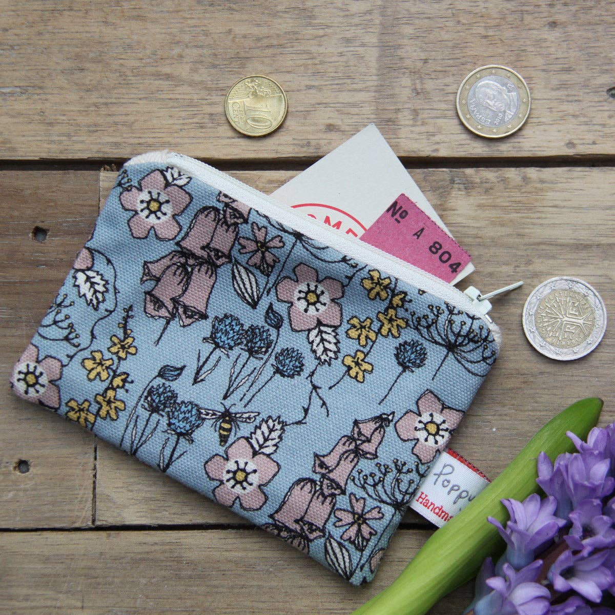 Small wild flowers purse