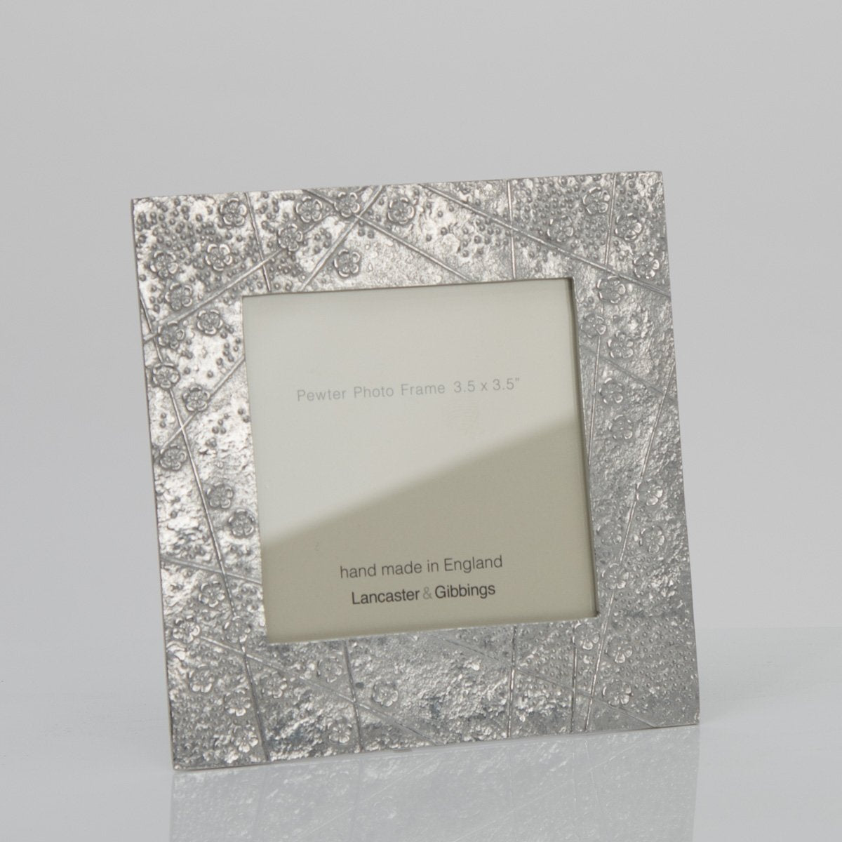 Pewter 'blossom' 3.5" square frame by Lancaster & Gibbings