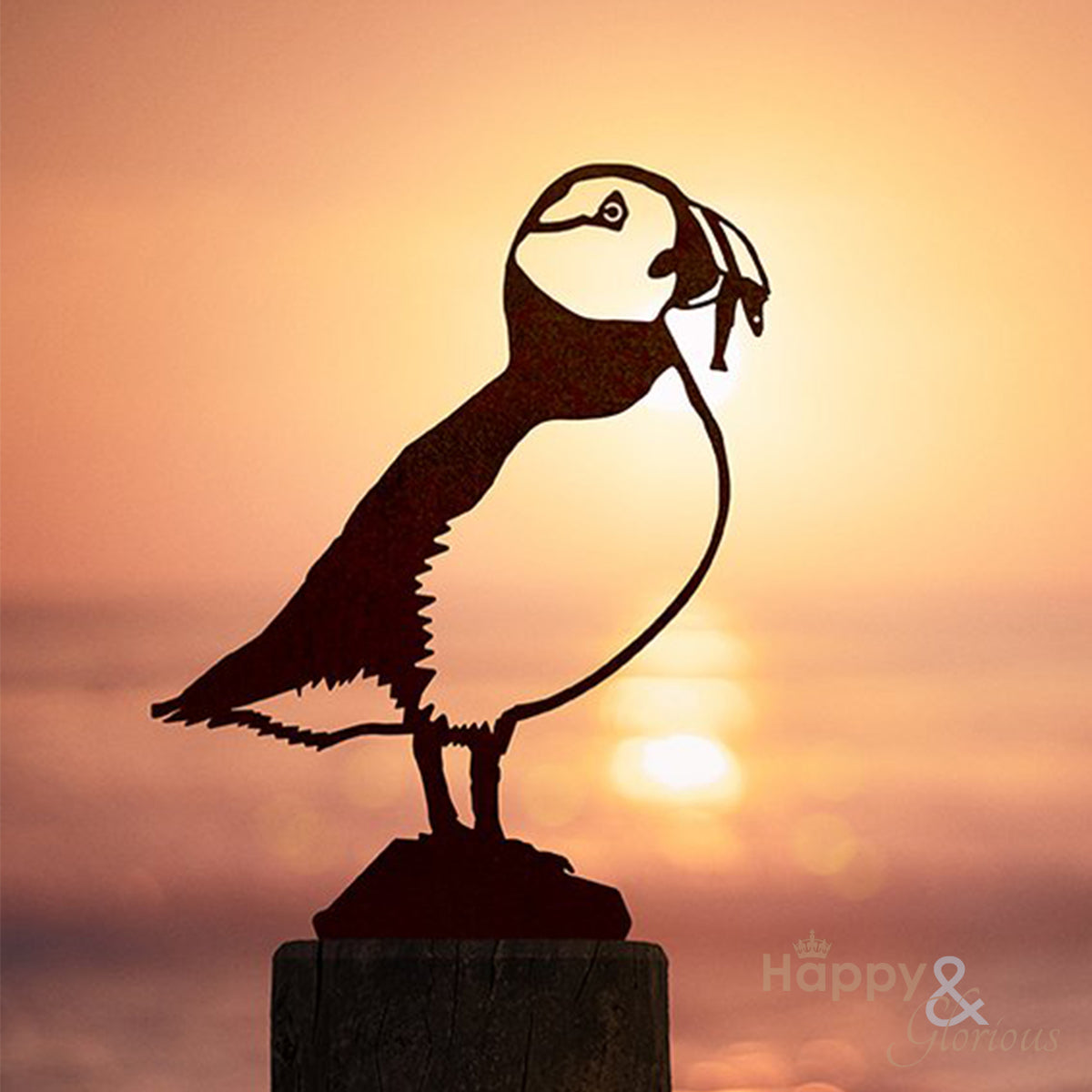 Steel puffin silhouette garden art