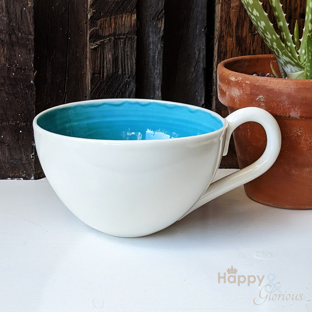 Turquoise porcelain cappuccino cup