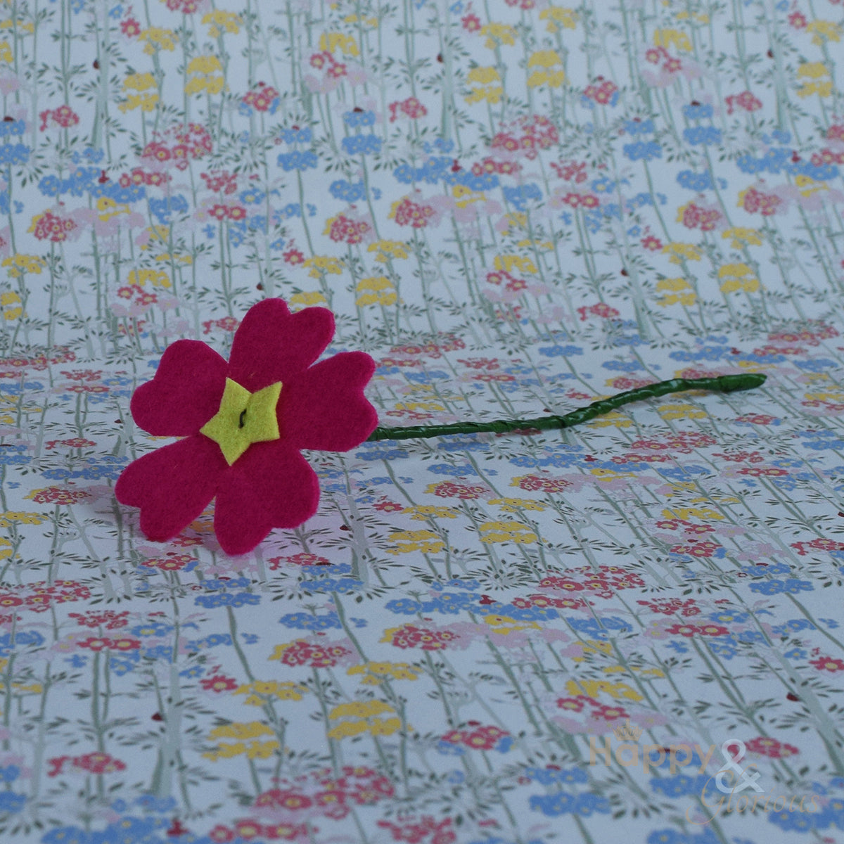 Handmade felt fabric primula flowers