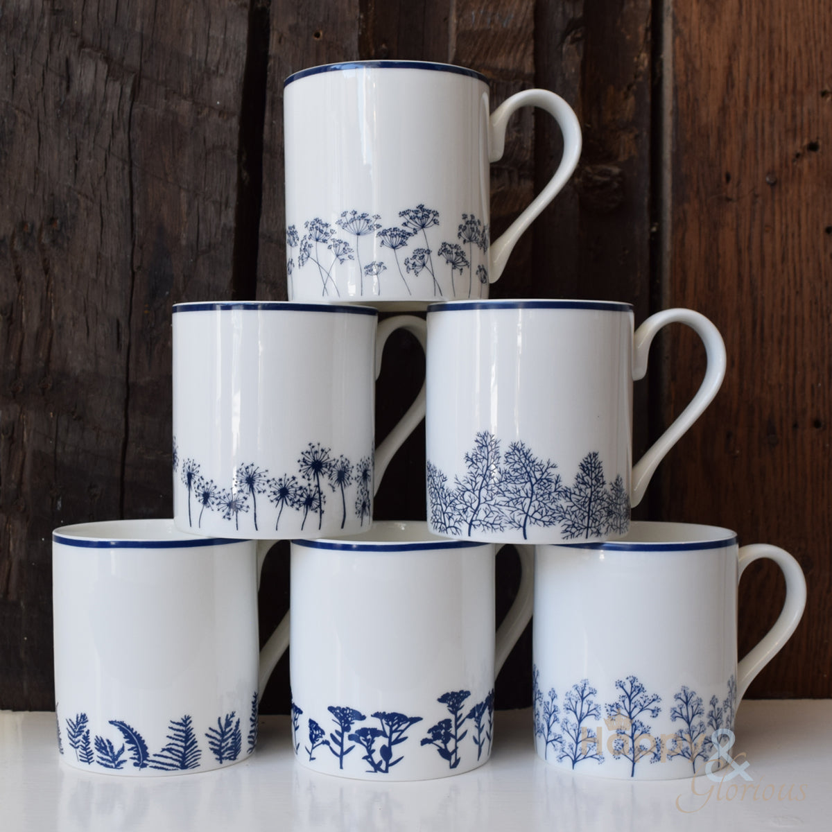 Navy blue & white fennel leaves silhouette fine china mug by Kate Tompsett