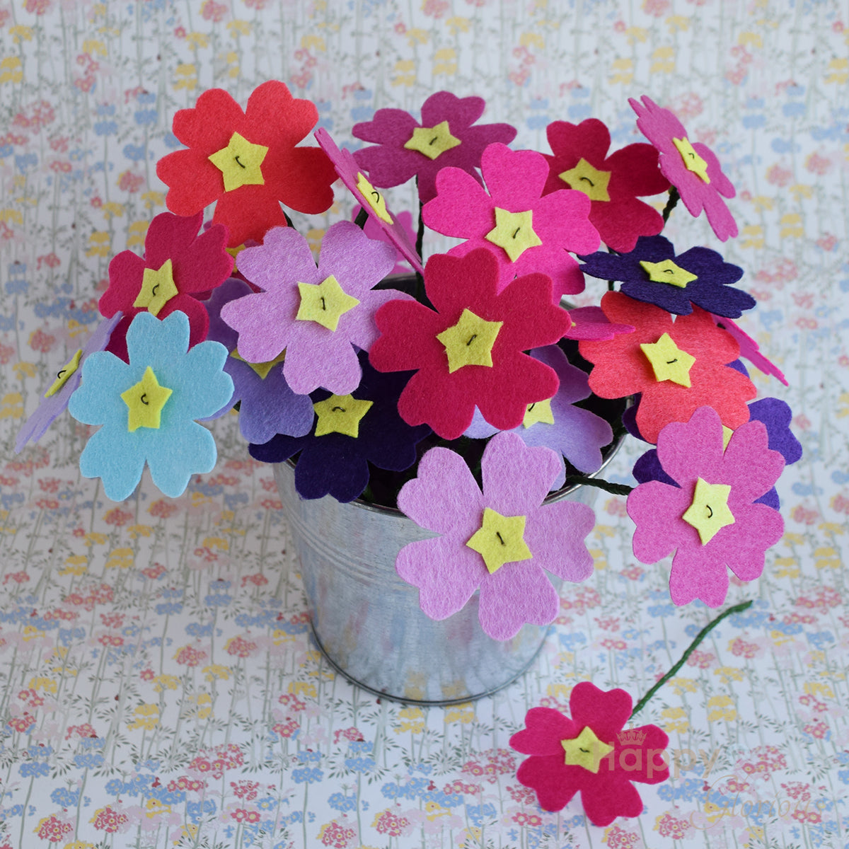 Handmade felt fabric primula flowers