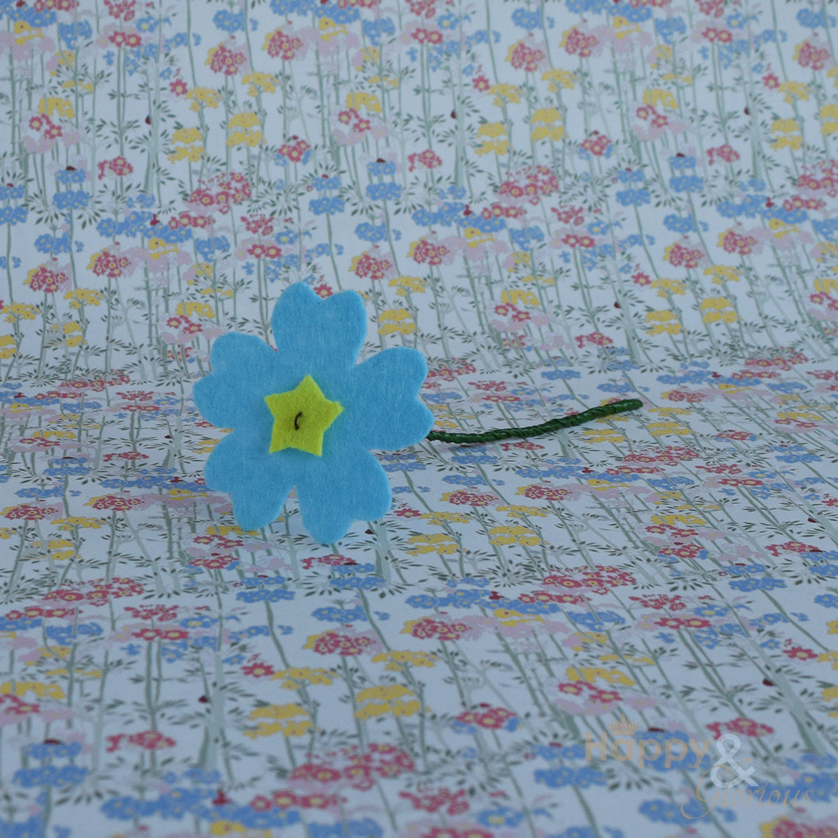 Handmade felt fabric primula flowers