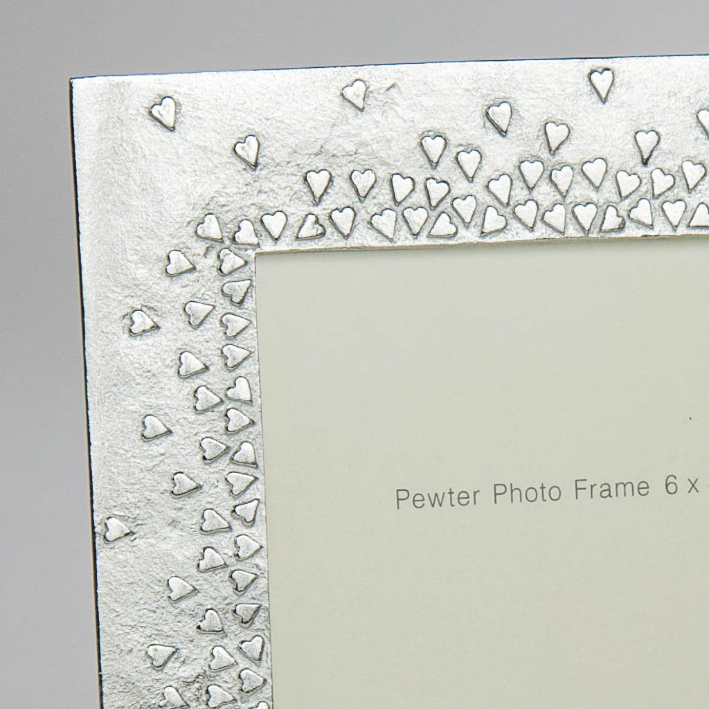 Pewter 'floating hearts' 6x4" frame by Lancaster & Gibbings