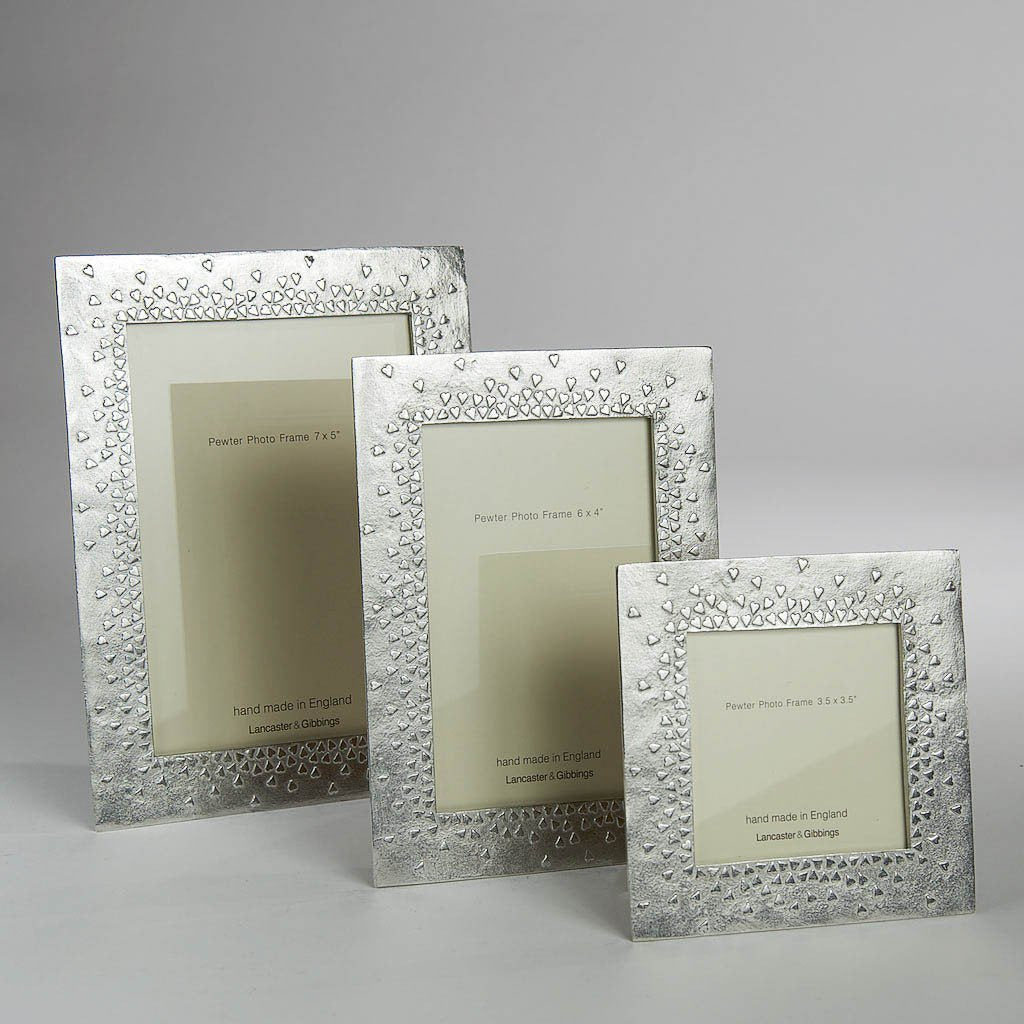 Pewter 'floating hearts' 6x4" frame by Lancaster & Gibbings