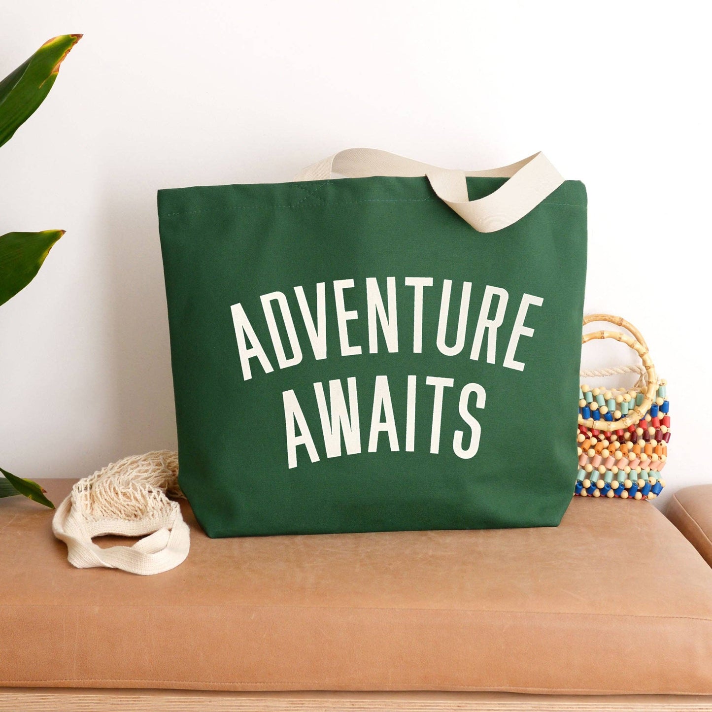 Adventure awaits forest green canvas tote bag