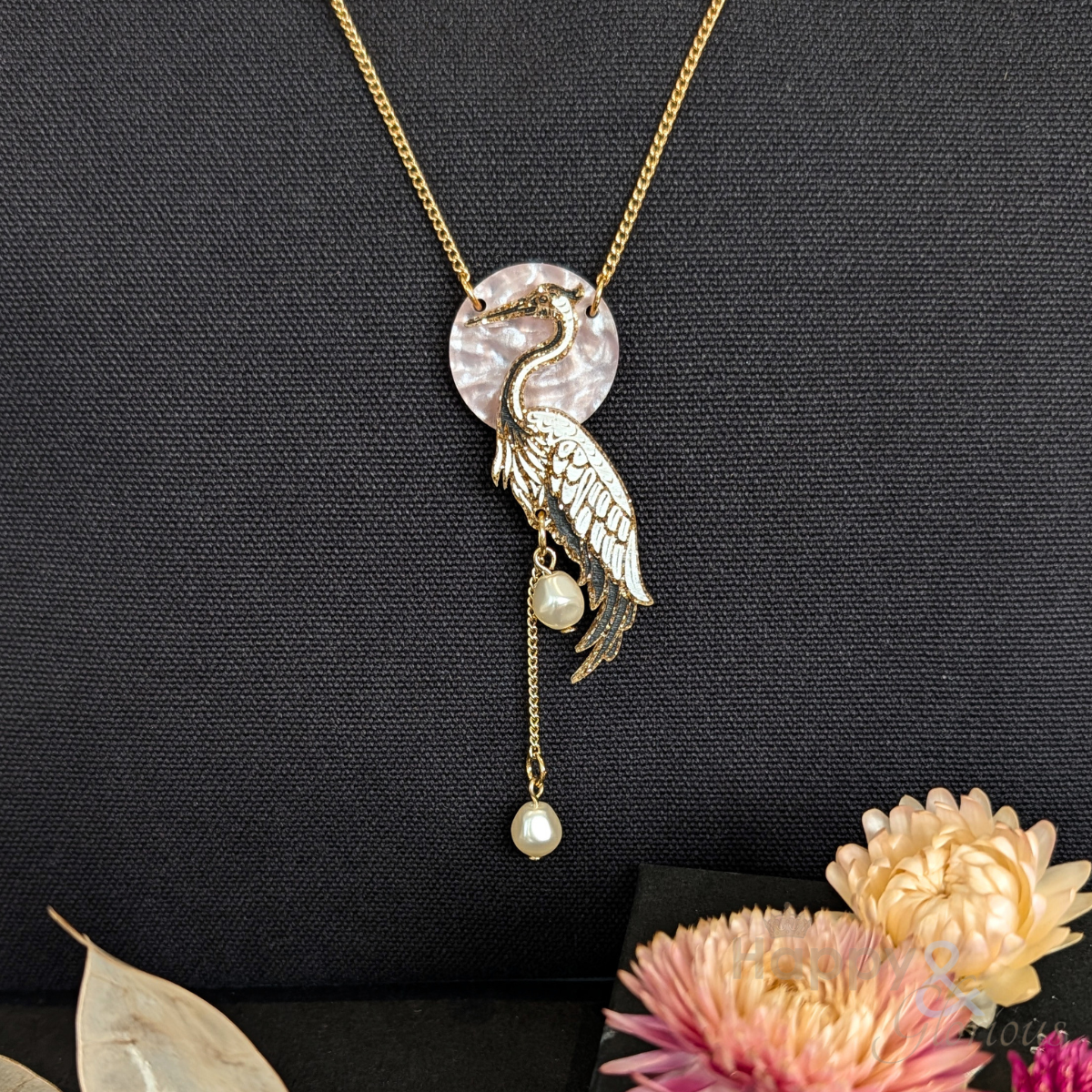 Crane pendant necklace by Tatty Devine