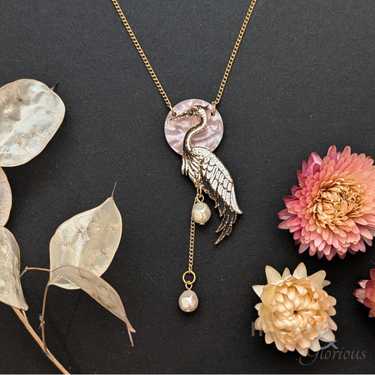 Crane pendant necklace by Tatty Devine