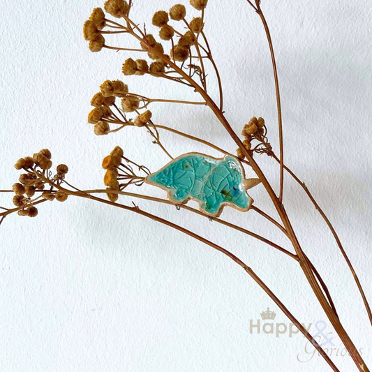 Tina triceratops plant pal decoration