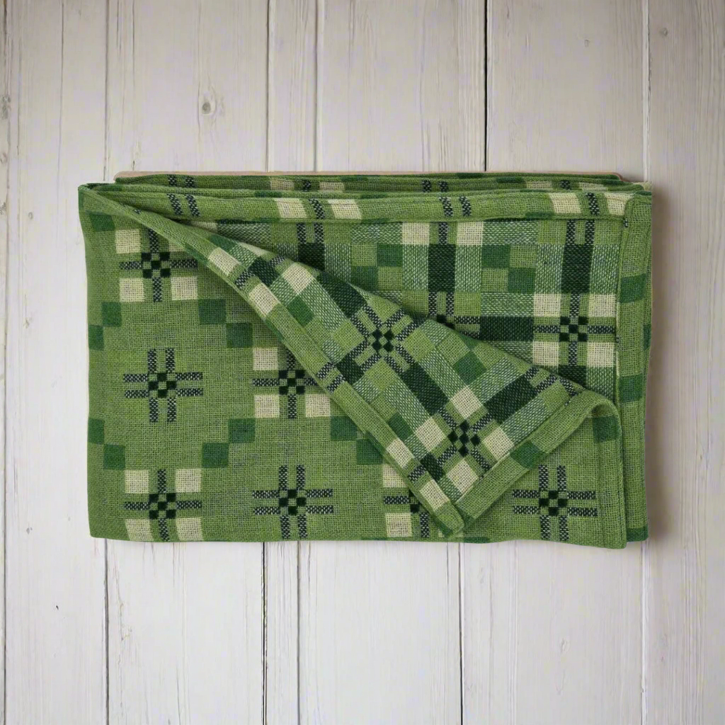 Deilen green St Davids Cross pure lambswool throw by Melin Tregwynt
