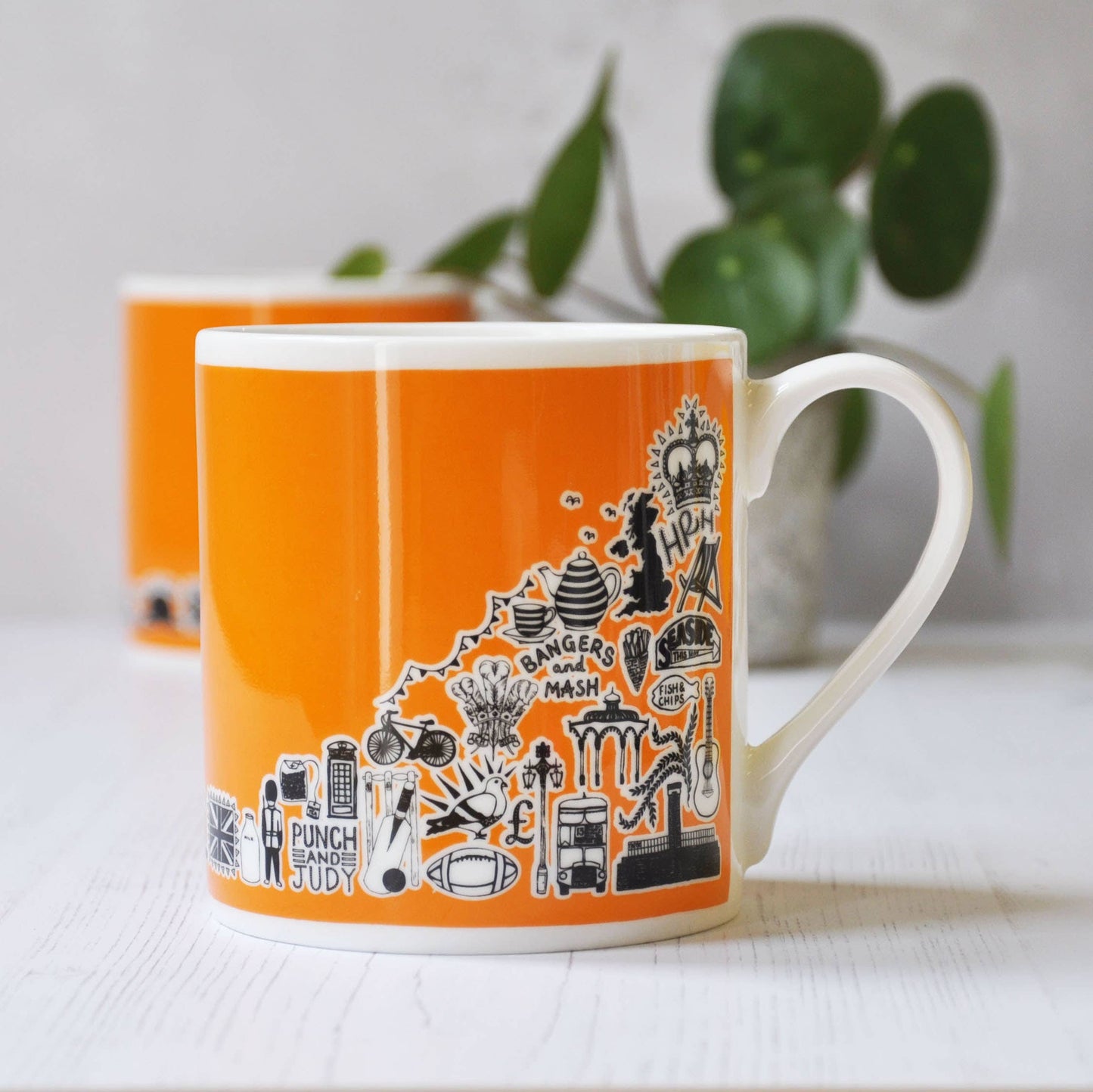British icons bright orange mug