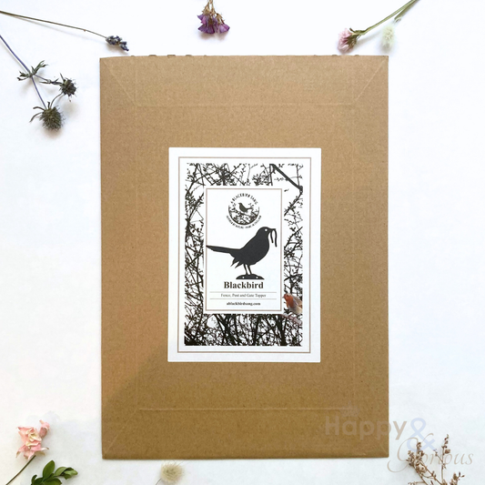 Steel blackbird & worm garden silhouette