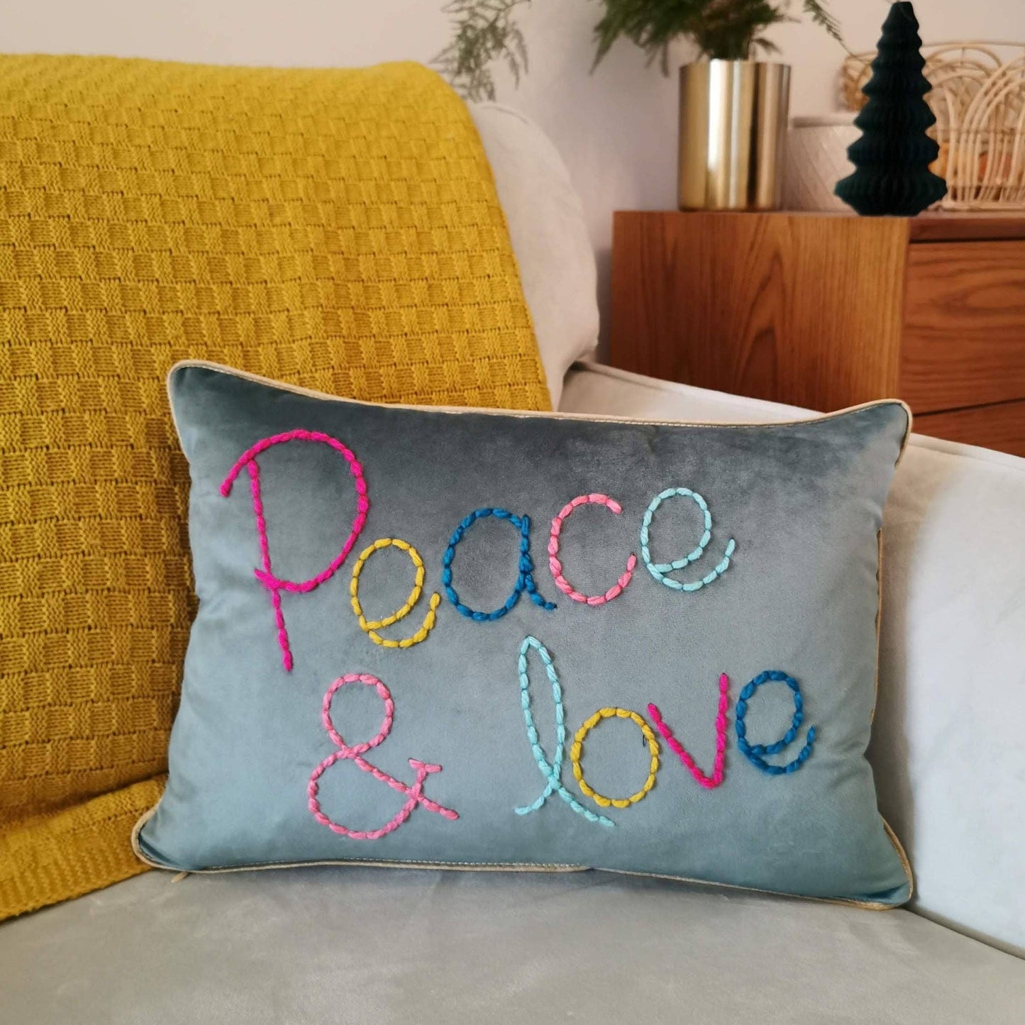 Peace & Love embroidered velvet cushion