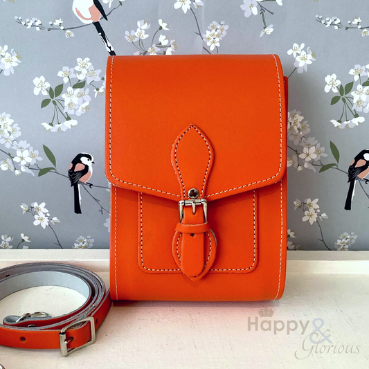 Handmade orange leather festival bag