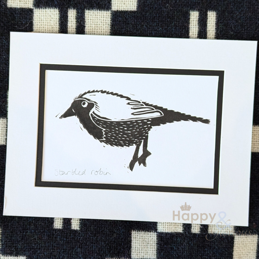 Startled robin lino print by Kate Tompsett