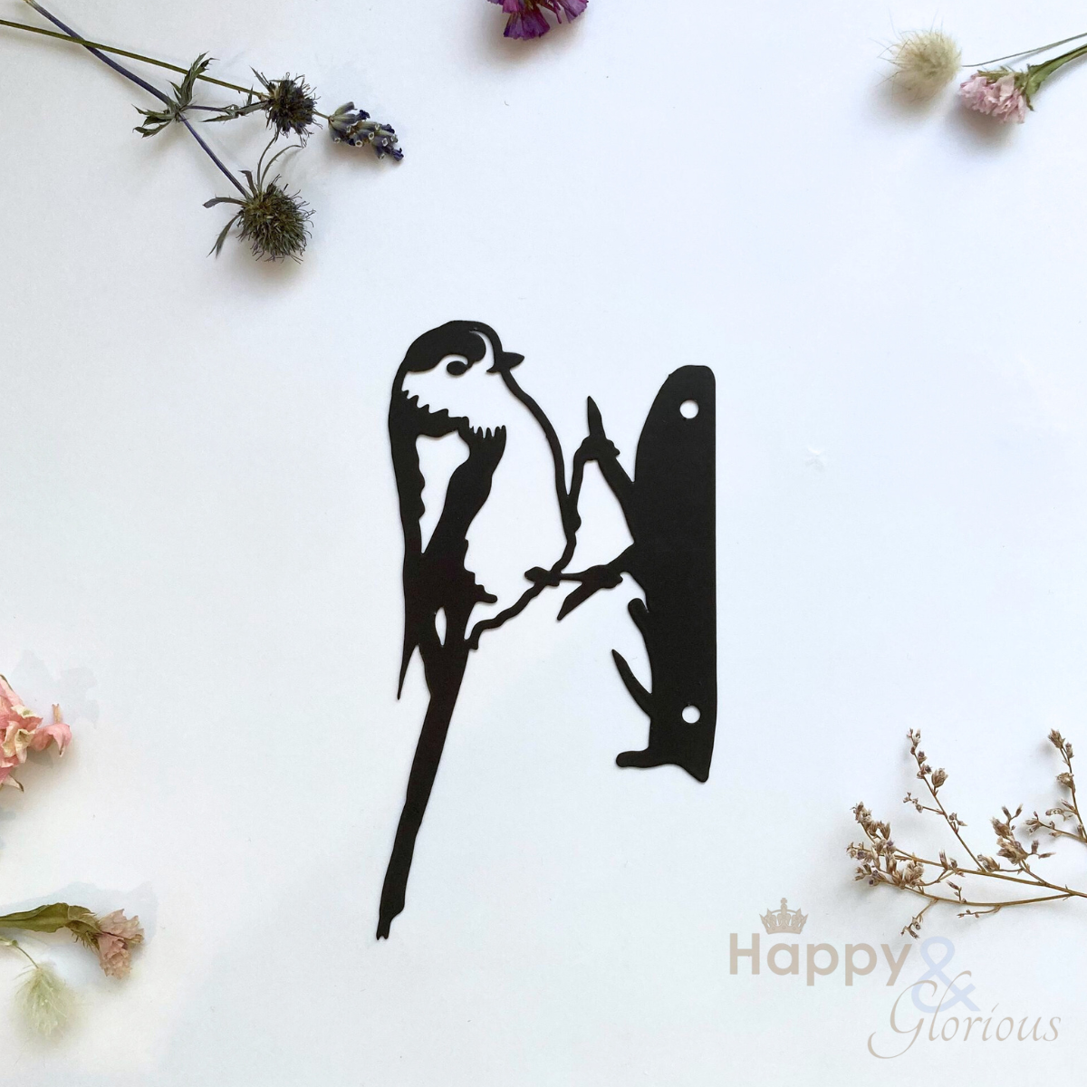 Steel long-tailed tit garden silhouette