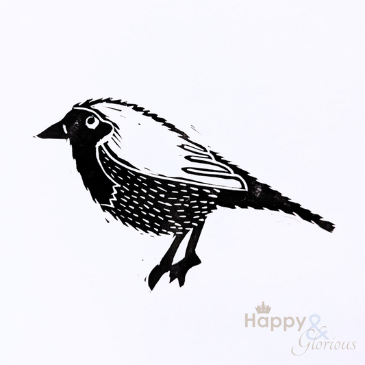 Startled robin lino print by Kate Tompsett