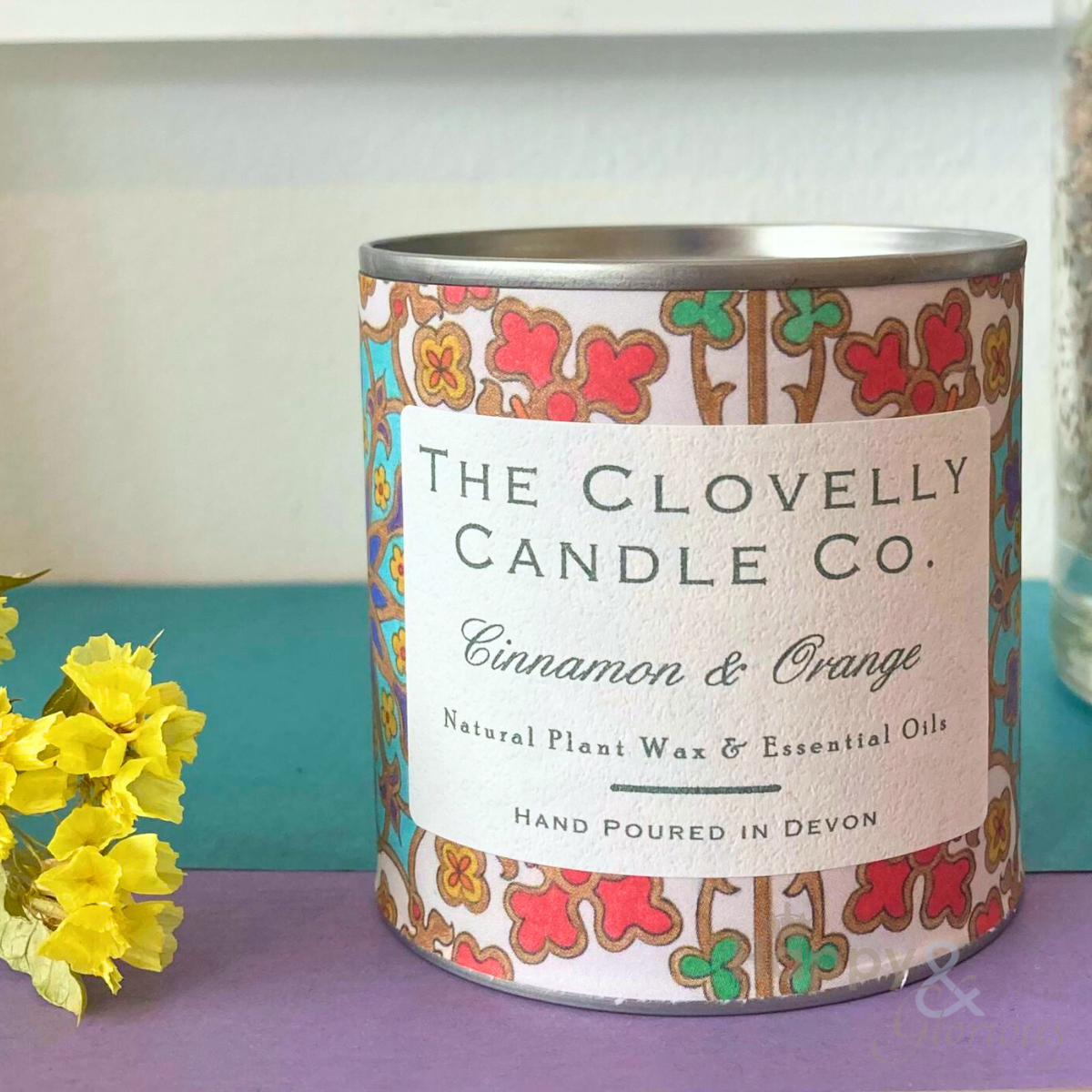 Clovelly cinnamon & orange essential oil candle in tin