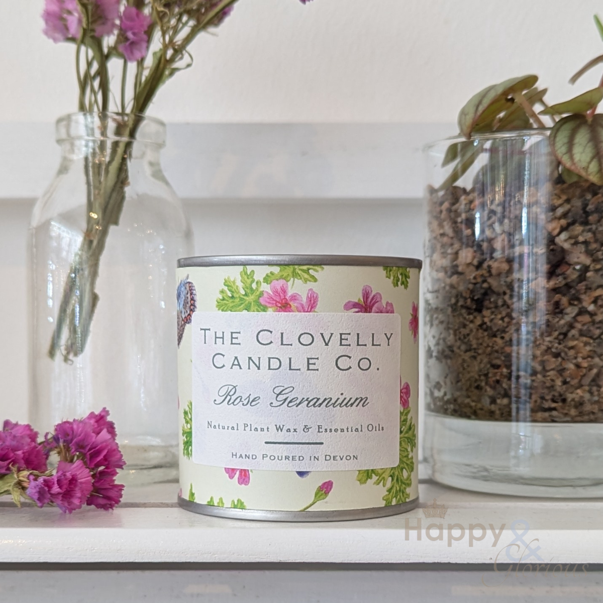 Clovelly rose geranium essential oil candle in tin
