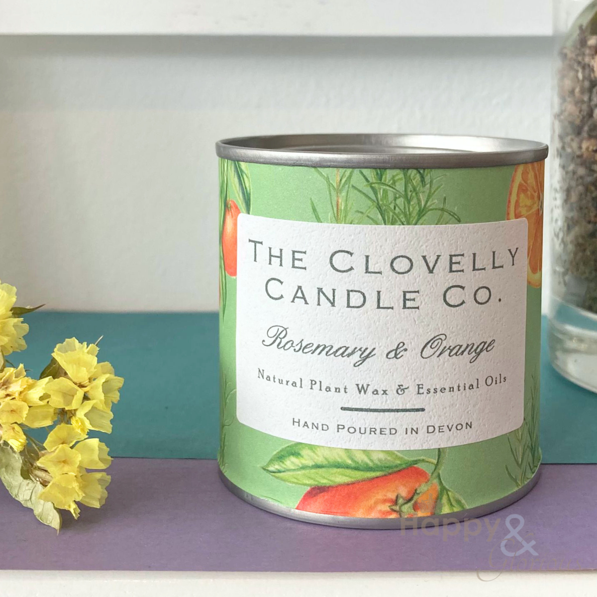 Clovelly rosemary & orange essential oil candle in tin