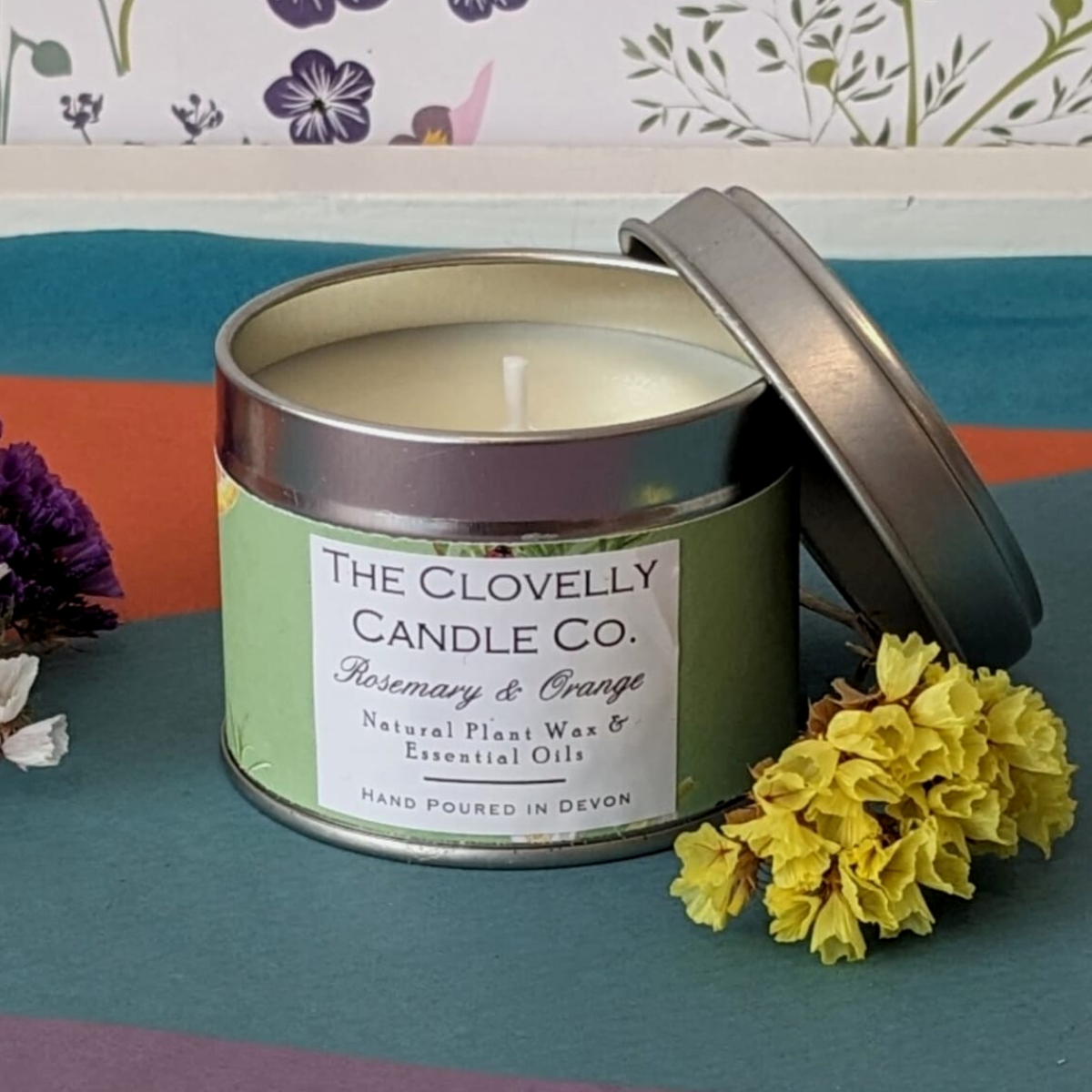 Clovelly rosemary & orange essential oil candle in tin