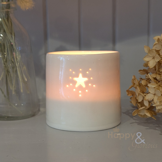 Porcelain starburst tealight candle holder by Luna Lighting