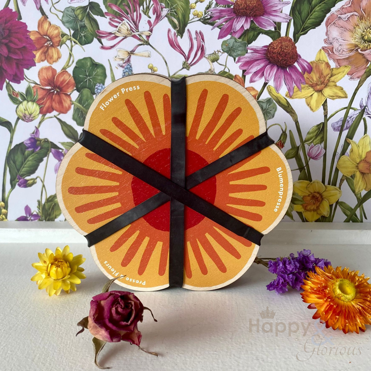 Yellow flower-shaped flower press