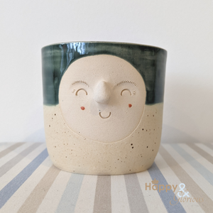 Hand thrown forest green stoneware face plant pot