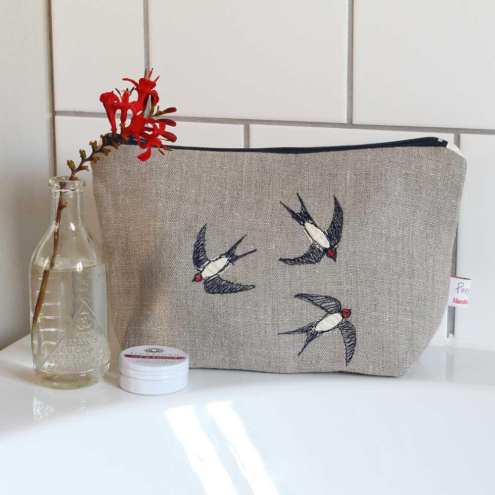 Embroidered swallows makeup bag