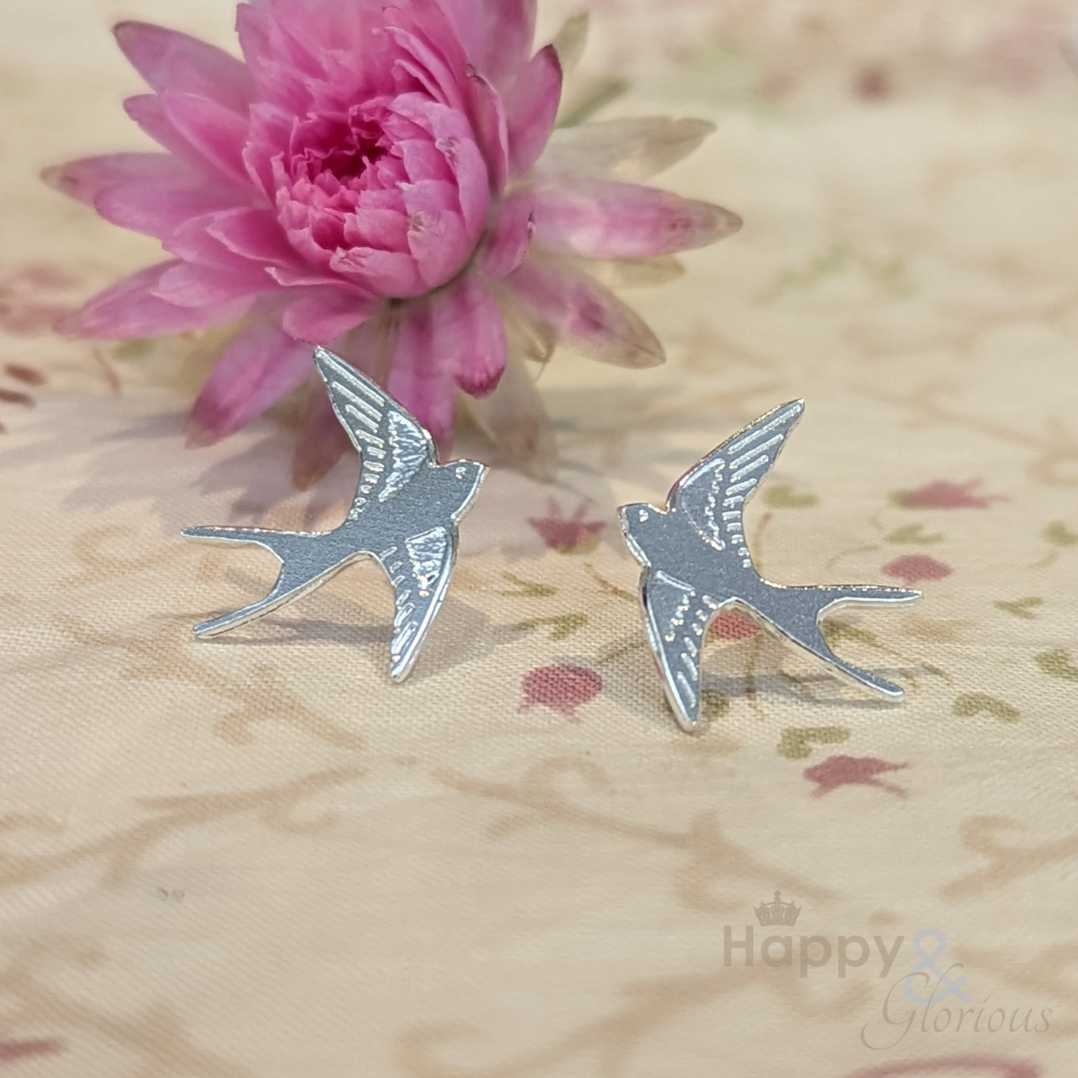 Sterling silver flying swallow stud earrings by Amanda Coleman