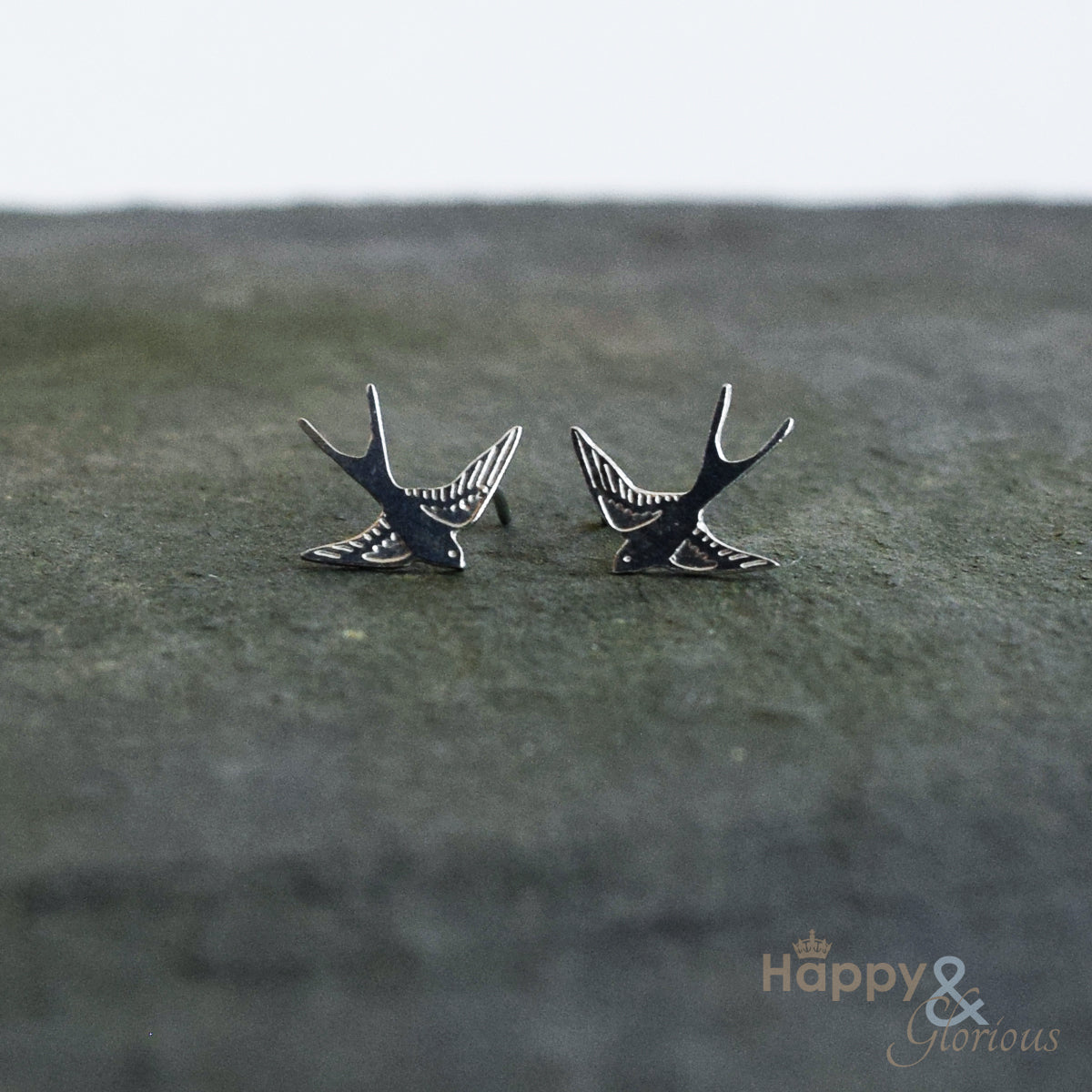Sterling silver flying swallow stud earrings by Amanda Coleman