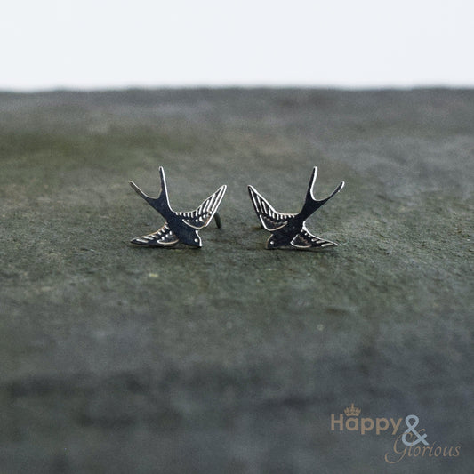 Sterling silver flying swallow stud earrings by Amanda Coleman