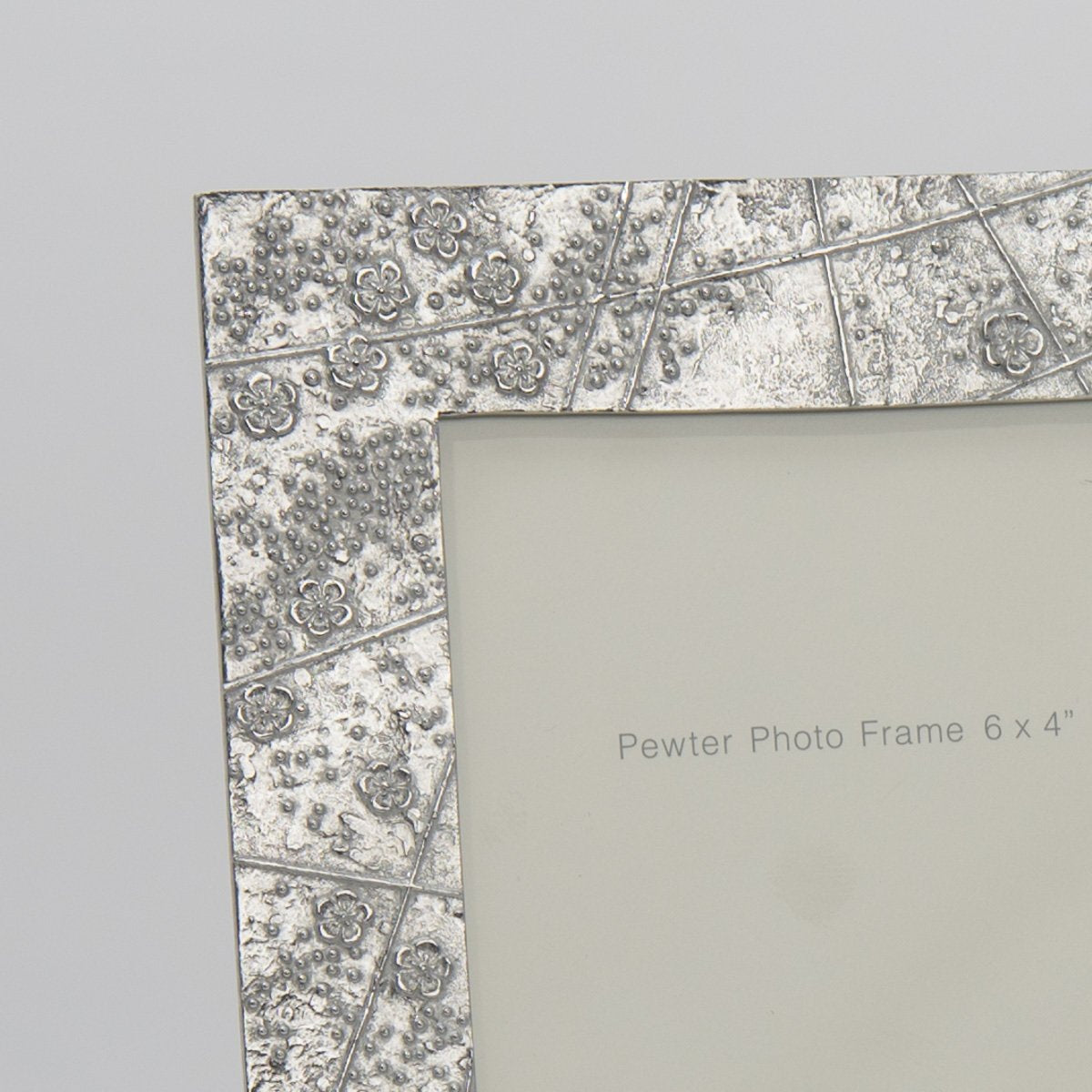 Pewter 'blossom' 7x5" frame by Lancaster & Gibbings