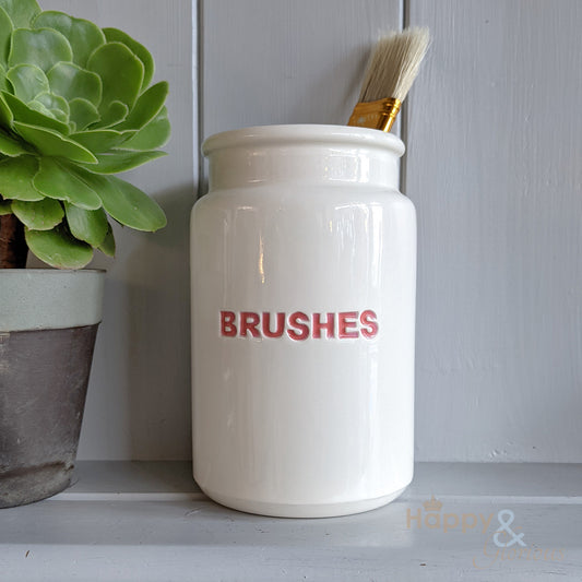 Red ceramic brush pot