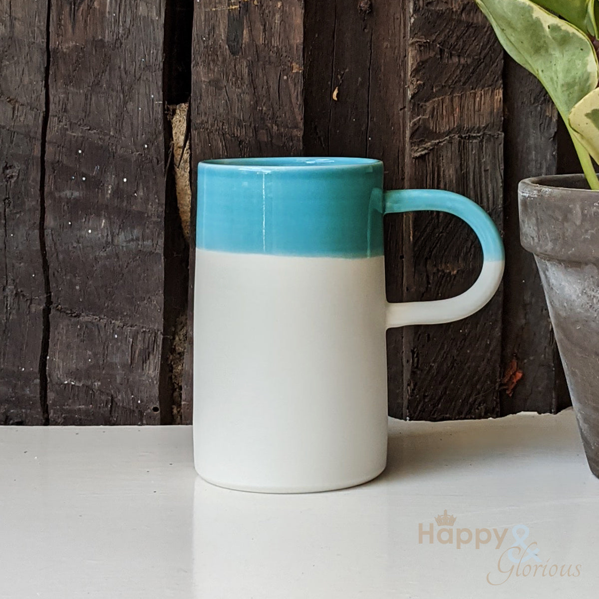 Turquoise blue porcelain tall dipped cup